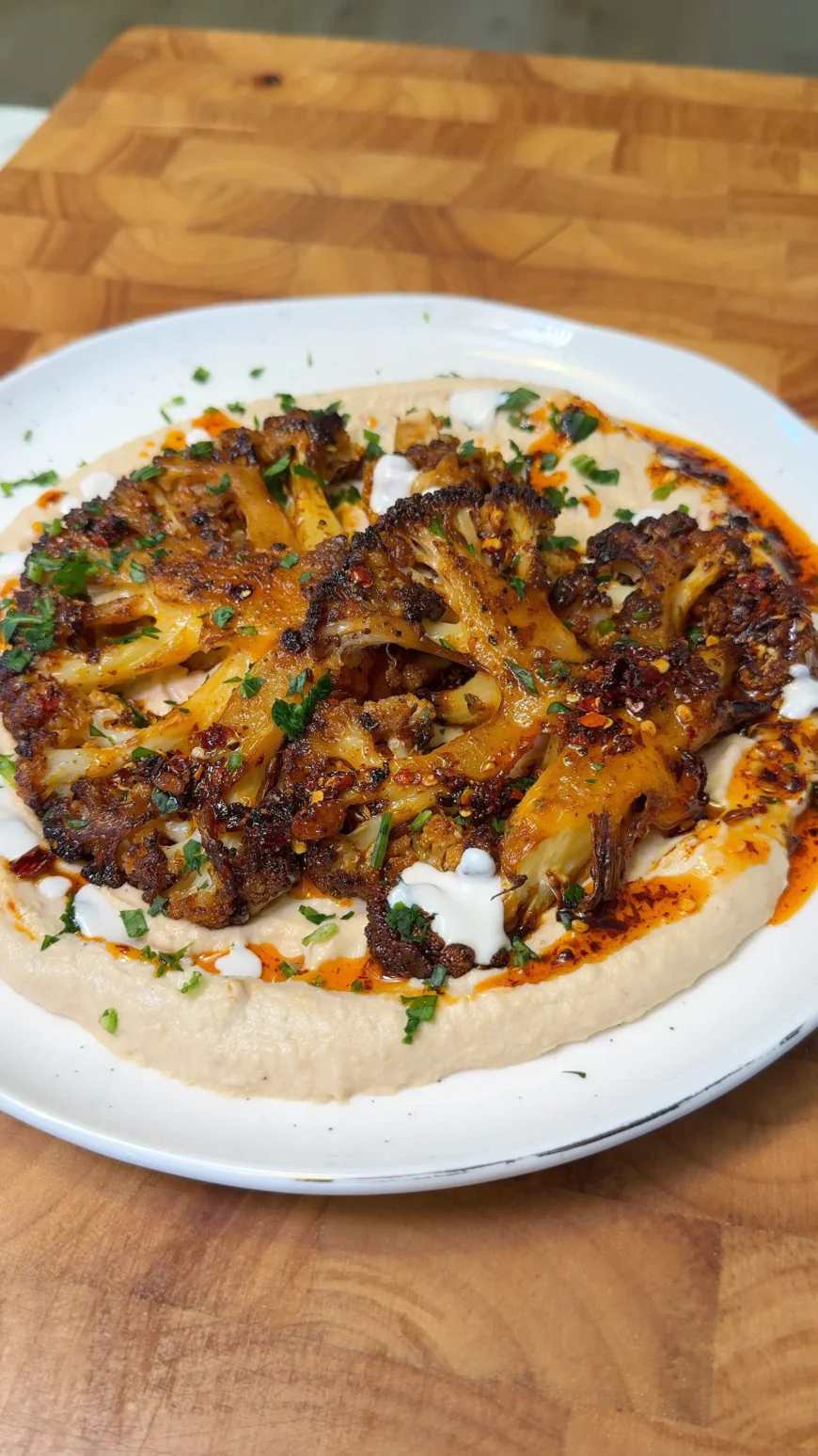 Spiced Roasted Cauliflower Steaks with Creamy Roasted Garlic Hummus